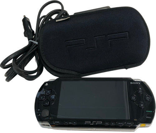 PSP - 1000 model + charger and carrying case [used]